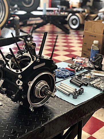 Engine cases split open on the bench, internals laid out